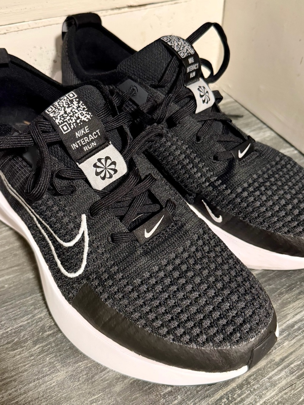 Nike Interact Run Women’s Black and White Athletic Sneakers